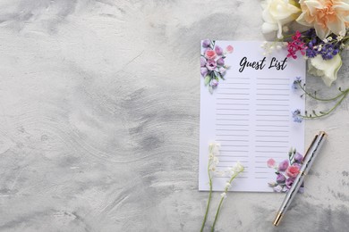 Guest list, pen and beautiful flowers on light textured background, flat lay. Space for text