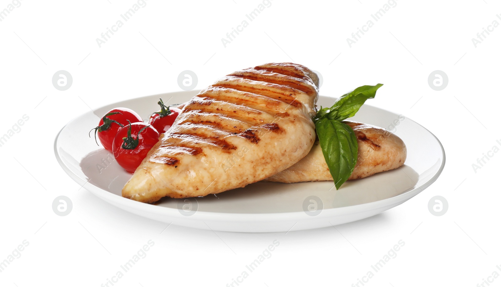 Photo of Tasty grilled chicken fillets with tomatoes and basil isolated on white