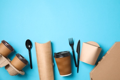 Different containers for mock up design on blue background, flat lay. Food delivery service