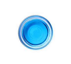 Glass bowl with light blue food coloring isolated on white, top view