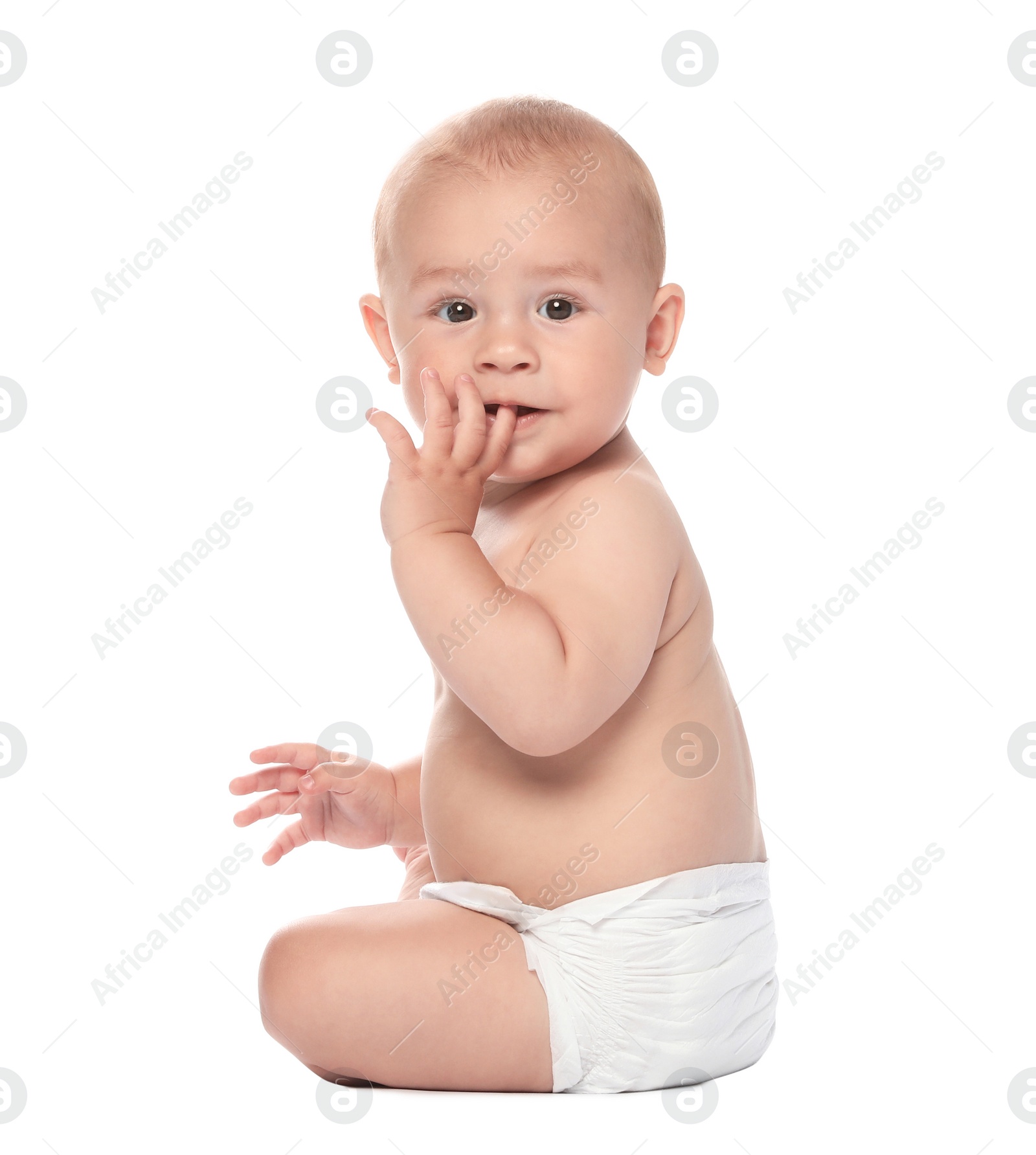 Photo of Cute little baby sitting on white background