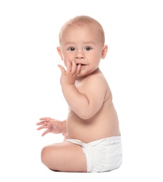 Cute little baby sitting on white background