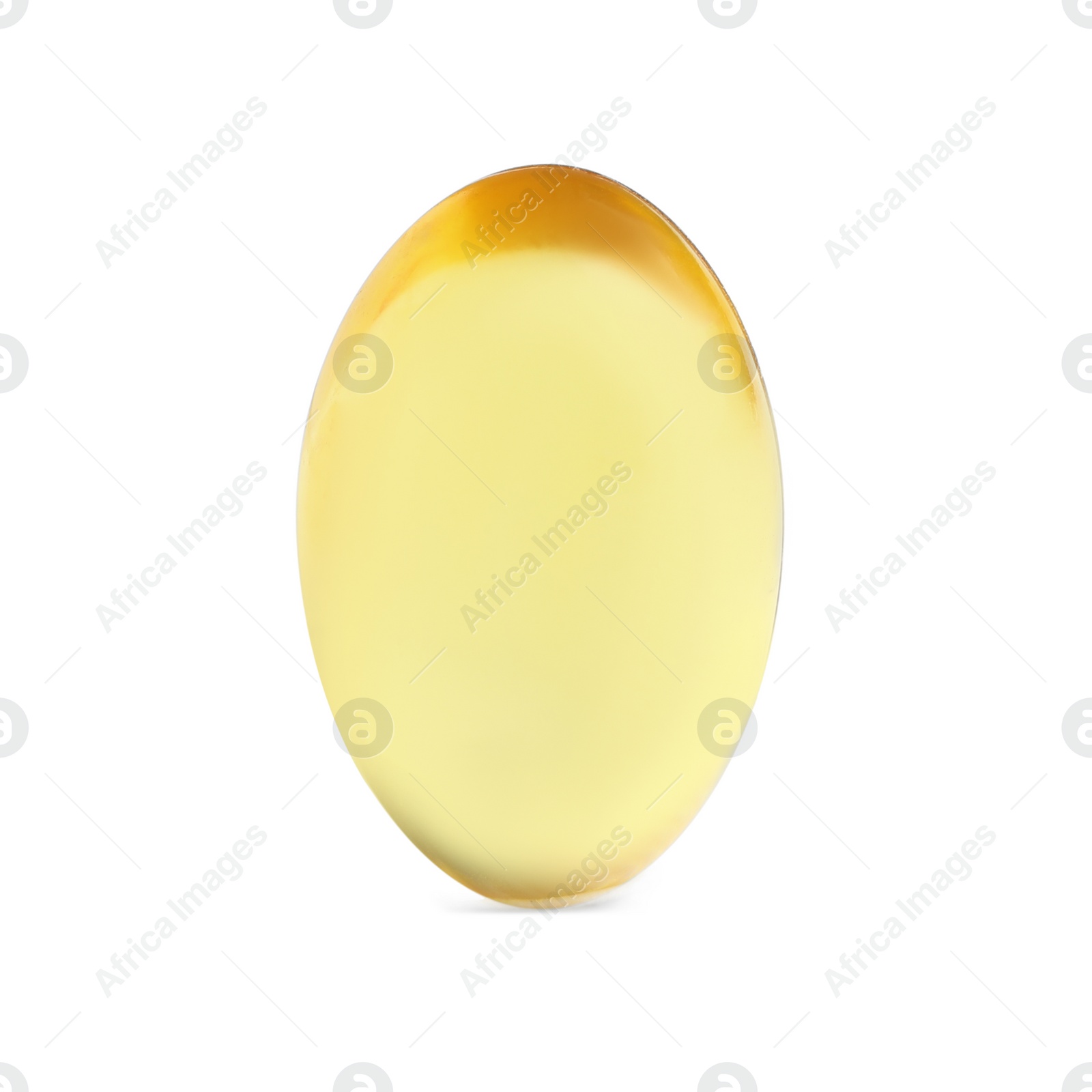 Photo of One yellow pill on white background. Medicinal treatment