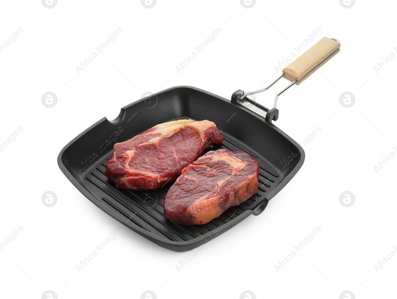 Photo of Grill pan with pieces of fresh beef meat isolated on white