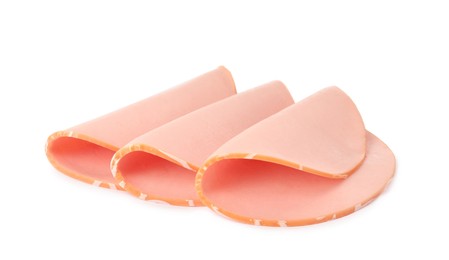 Slices of delicious boiled sausage on white background