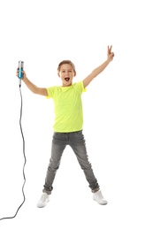 Cute boy with microphone on white background