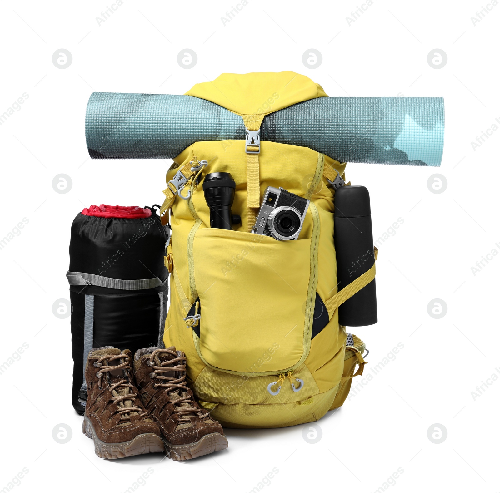 Photo of Set of camping equipment for tourist on white background