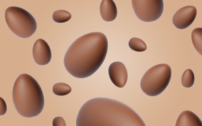 Image of Many chocolate eggs falling on dark beige background