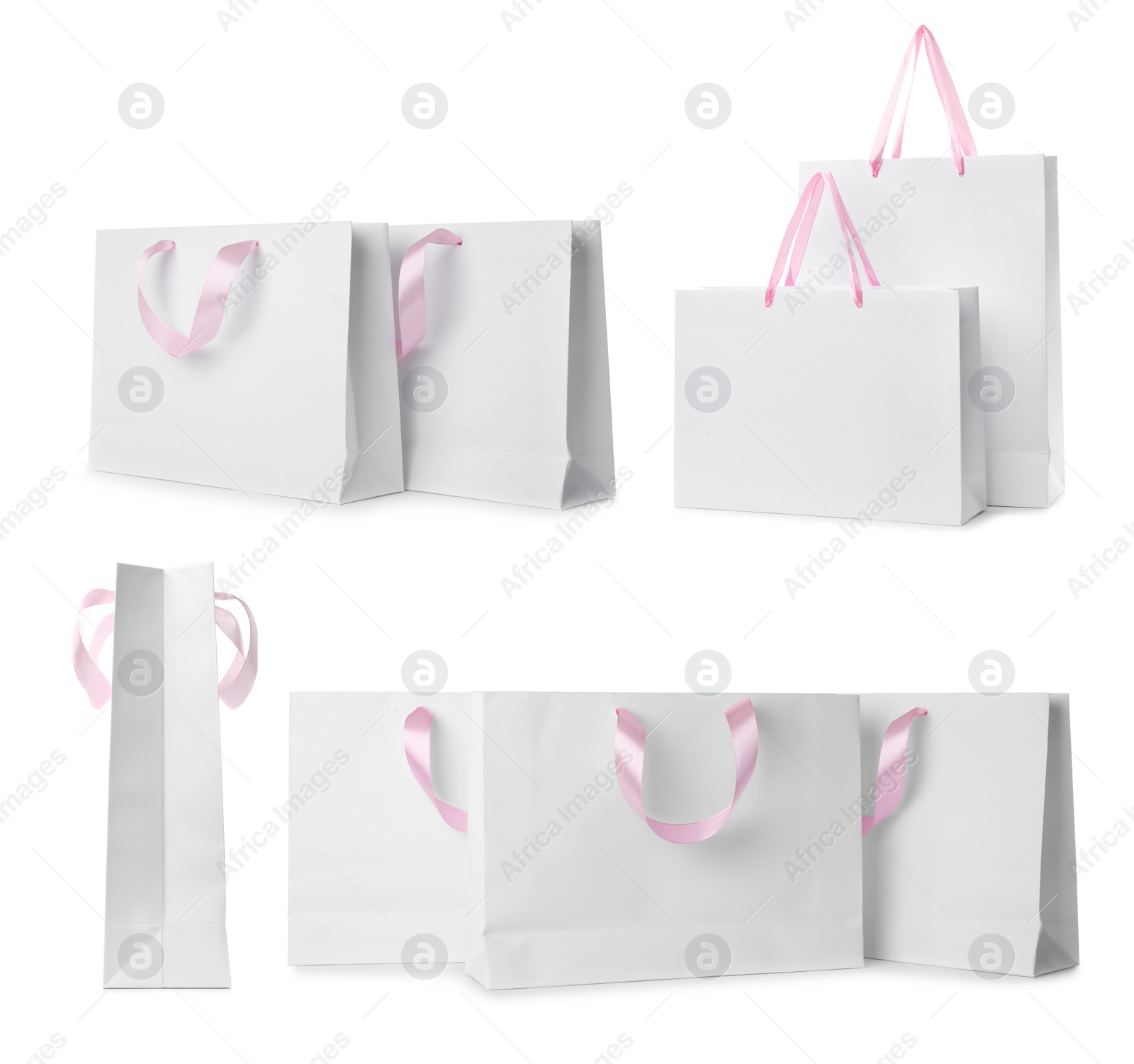 Image of Set with paper shopping bags on white background