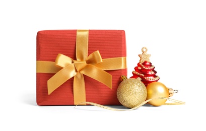 Photo of Beautifully wrapped gift box and decorations on white background