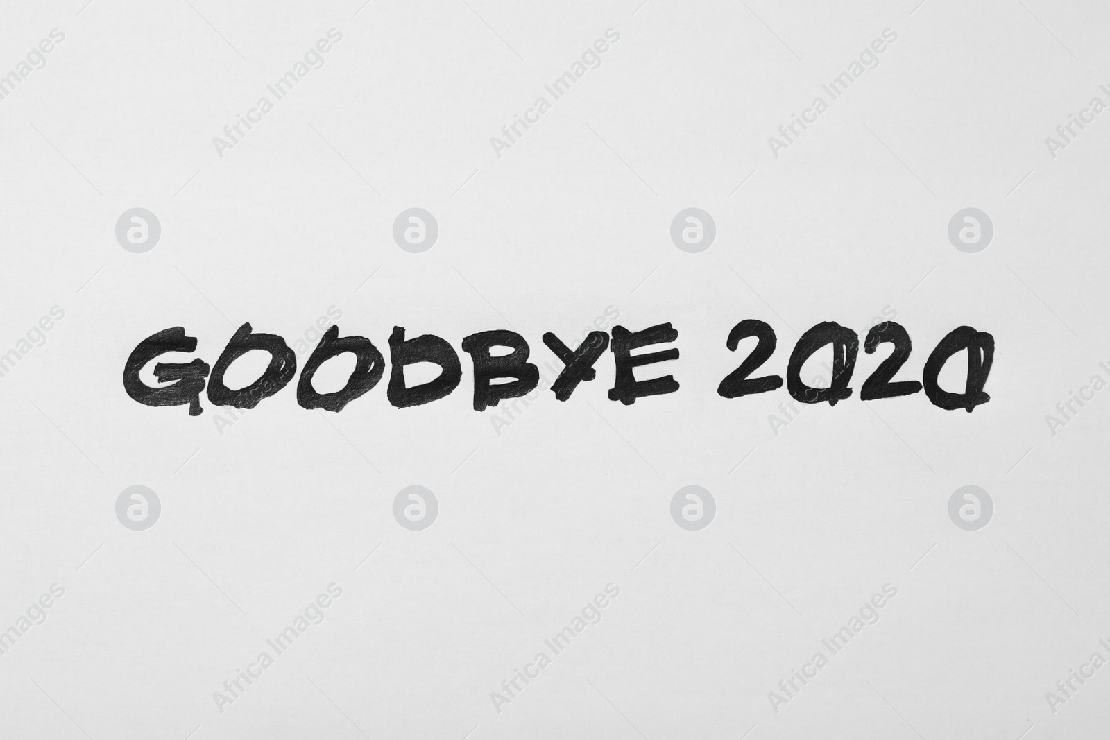 Photo of Text Goodbye 2020 written on white background