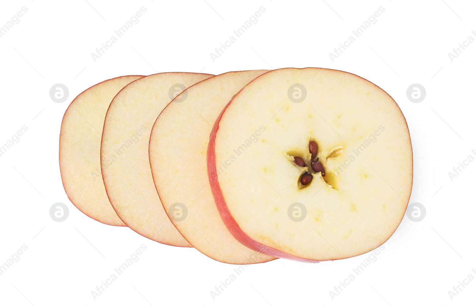 Photo of Slices of ripe red apple isolated on white, top view