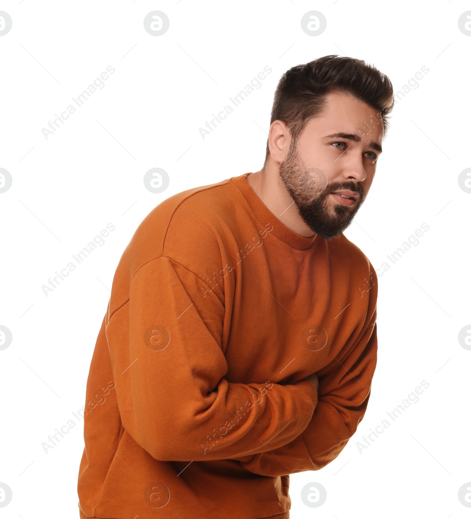 Photo of Young man suffering from stomach pain on white background