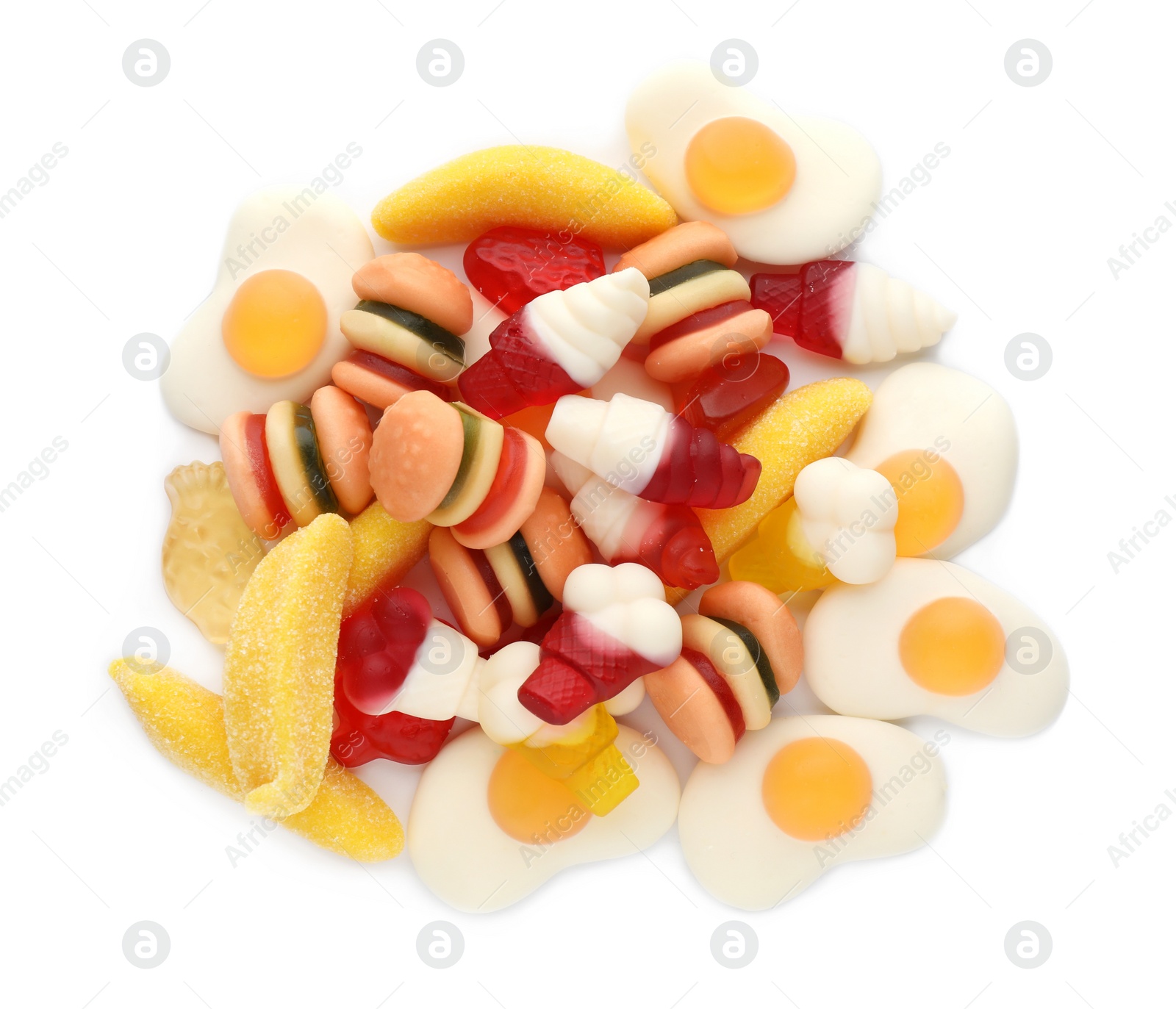 Photo of Pile of different tasty jelly candies on white background, top view