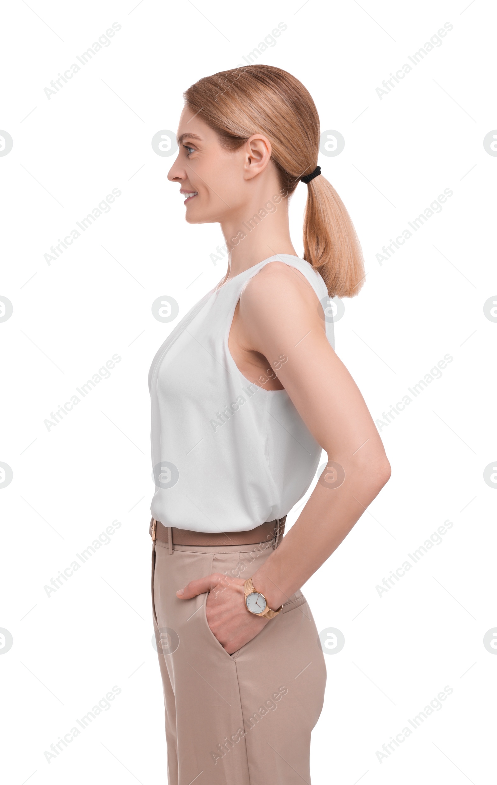 Photo of Beautiful happy businesswoman posing on white background