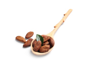 Photo of Wooden spoon with cocoa beans and leaf isolated on white