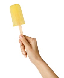 Photo of Woman holding tasty fruit ice pop on white background, closeup
