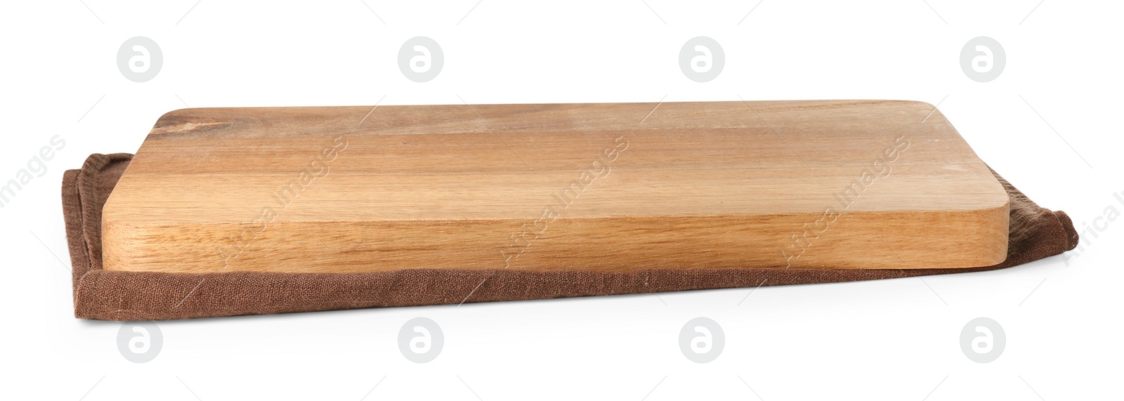 Photo of Wooden cutting board and kitchen towel on white background