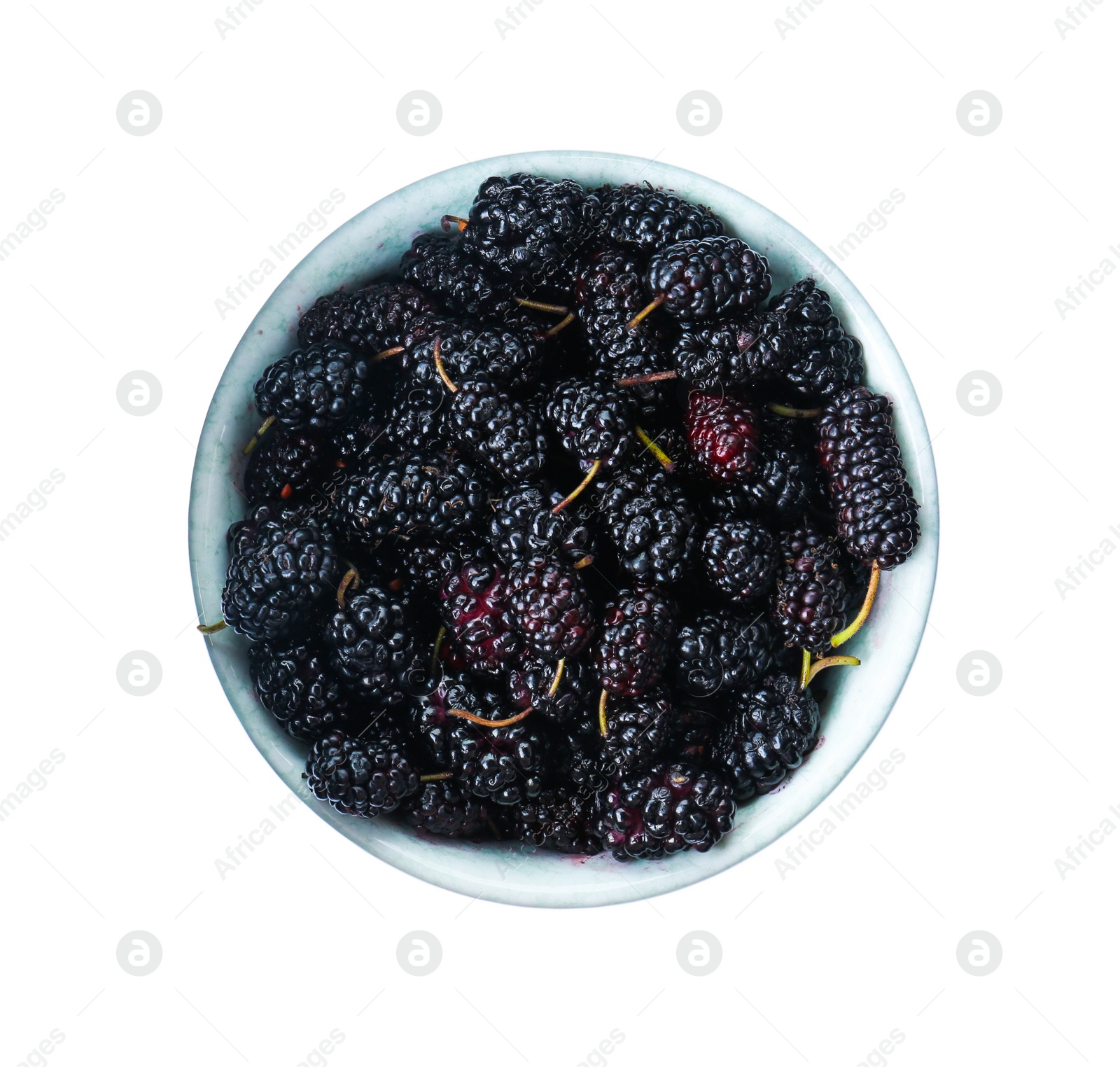 Photo of Bowl of delicious ripe black mulberries isolated on white, top view