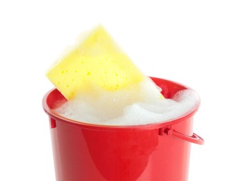 Photo of Plastic bucket with foam and sponge isolated on white. Cleaning supplies