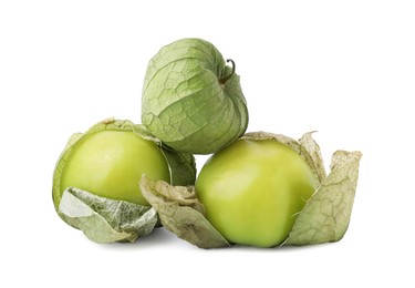 Photo of Fresh green tomatillos with husk isolated on white