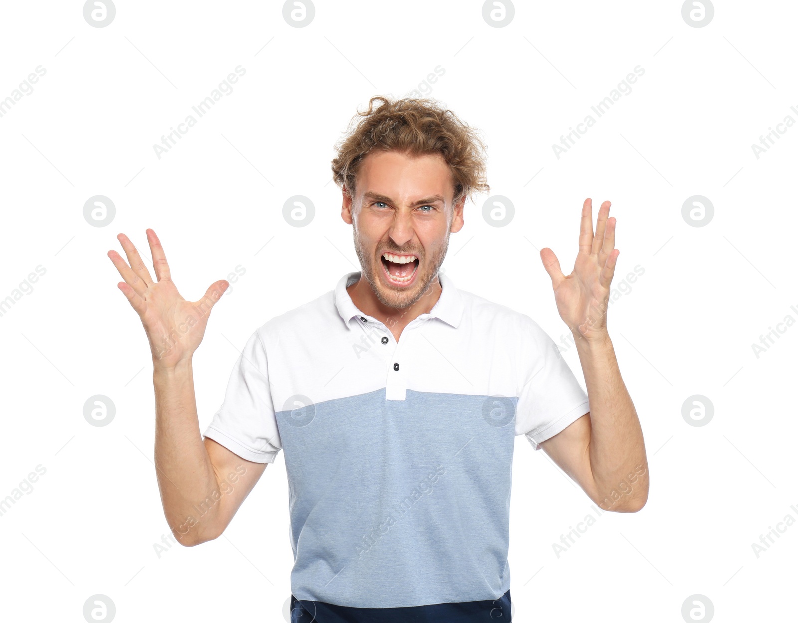 Photo of Young man in casual clothes posing on white background