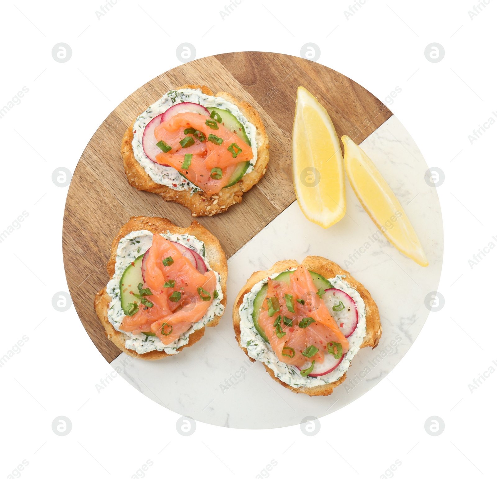 Photo of Tasty canapes with salmon, cucumber, radish and cream cheese isolated on white, top view