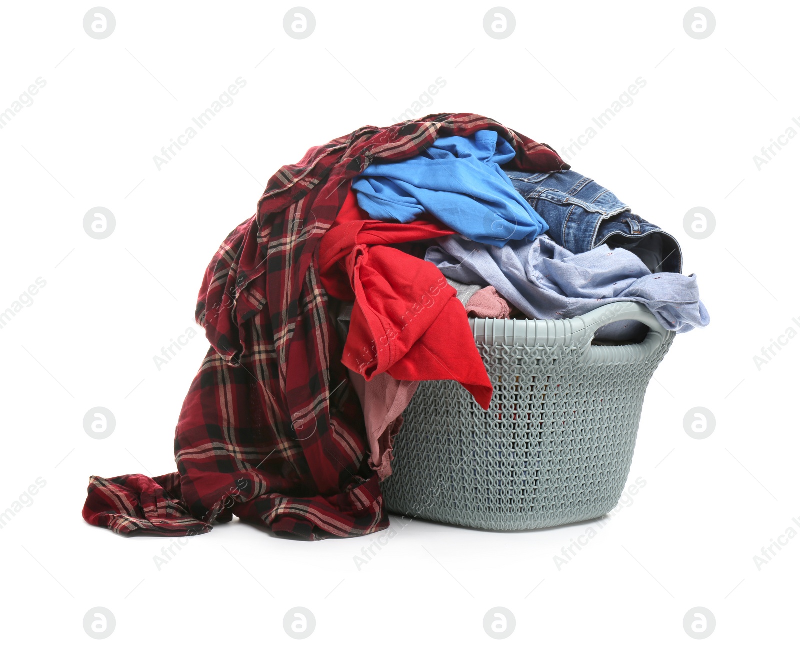 Photo of Plastic laundry basket full of clothes isolated on white