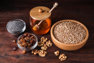 Photo of Ingredients for traditional kutia on wooden table