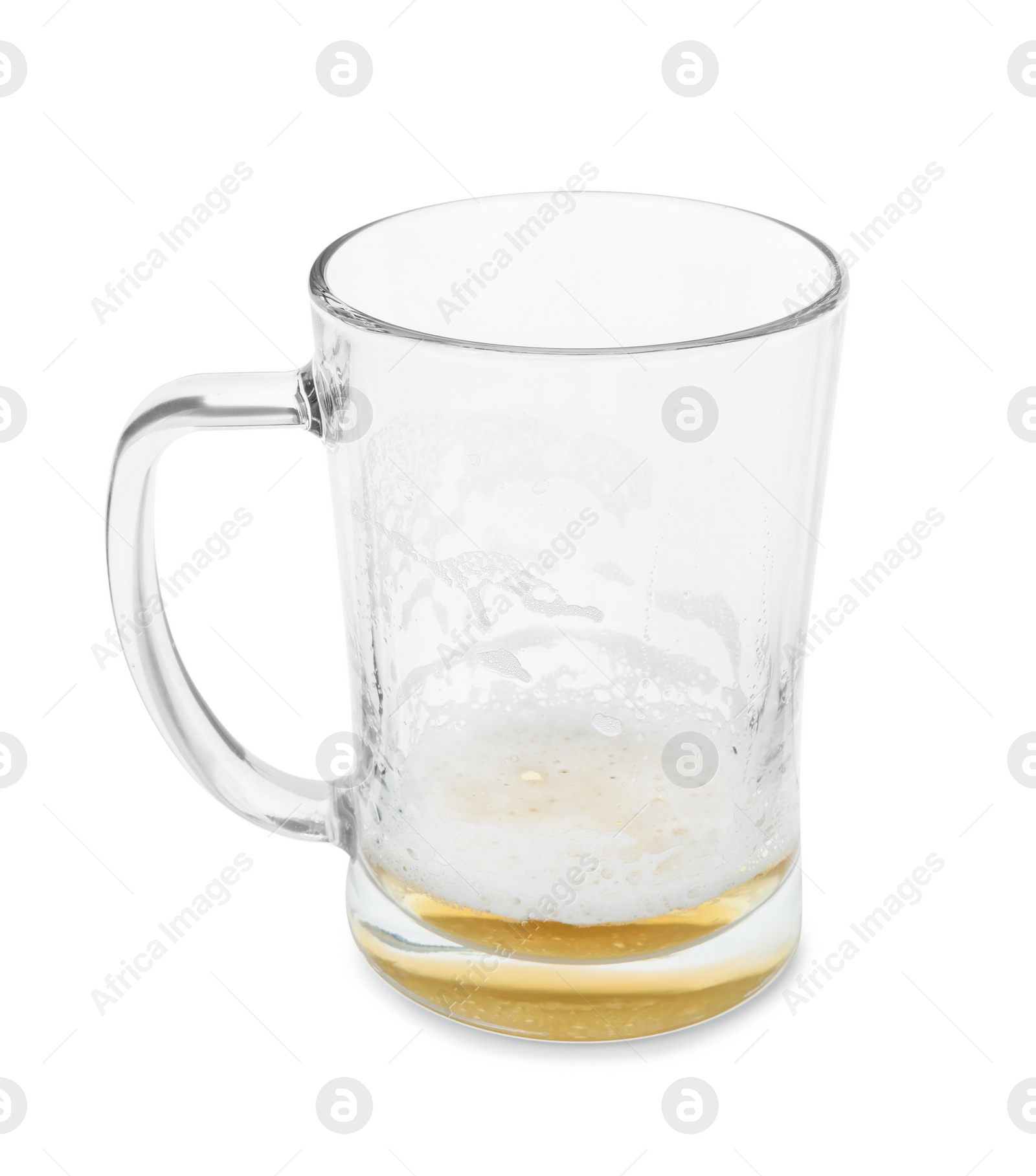 Photo of Almost empty mug of beer isolated on white