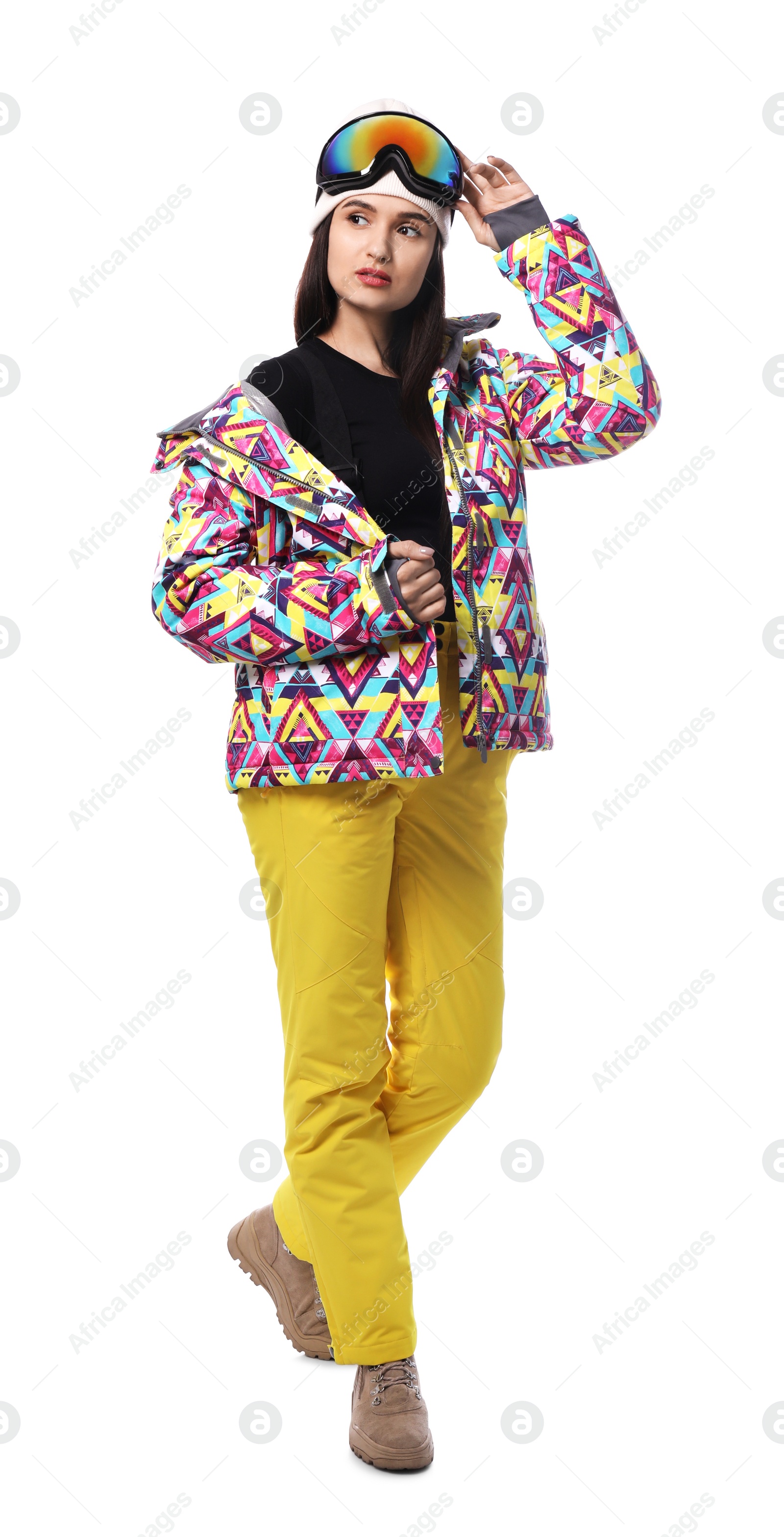 Photo of Woman wearing stylish winter sport clothes on white background