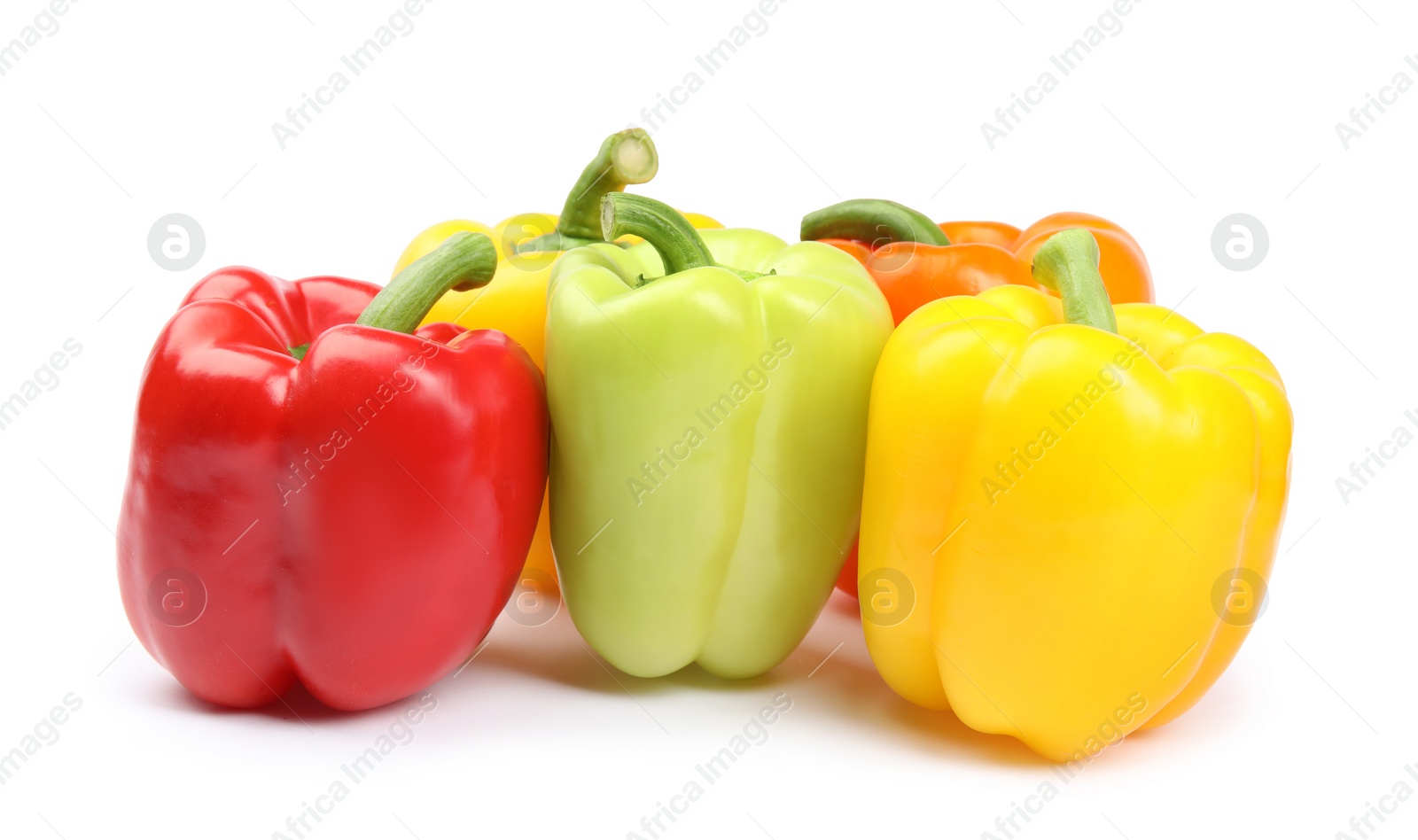 Photo of Fresh ripe bell peppers on white background