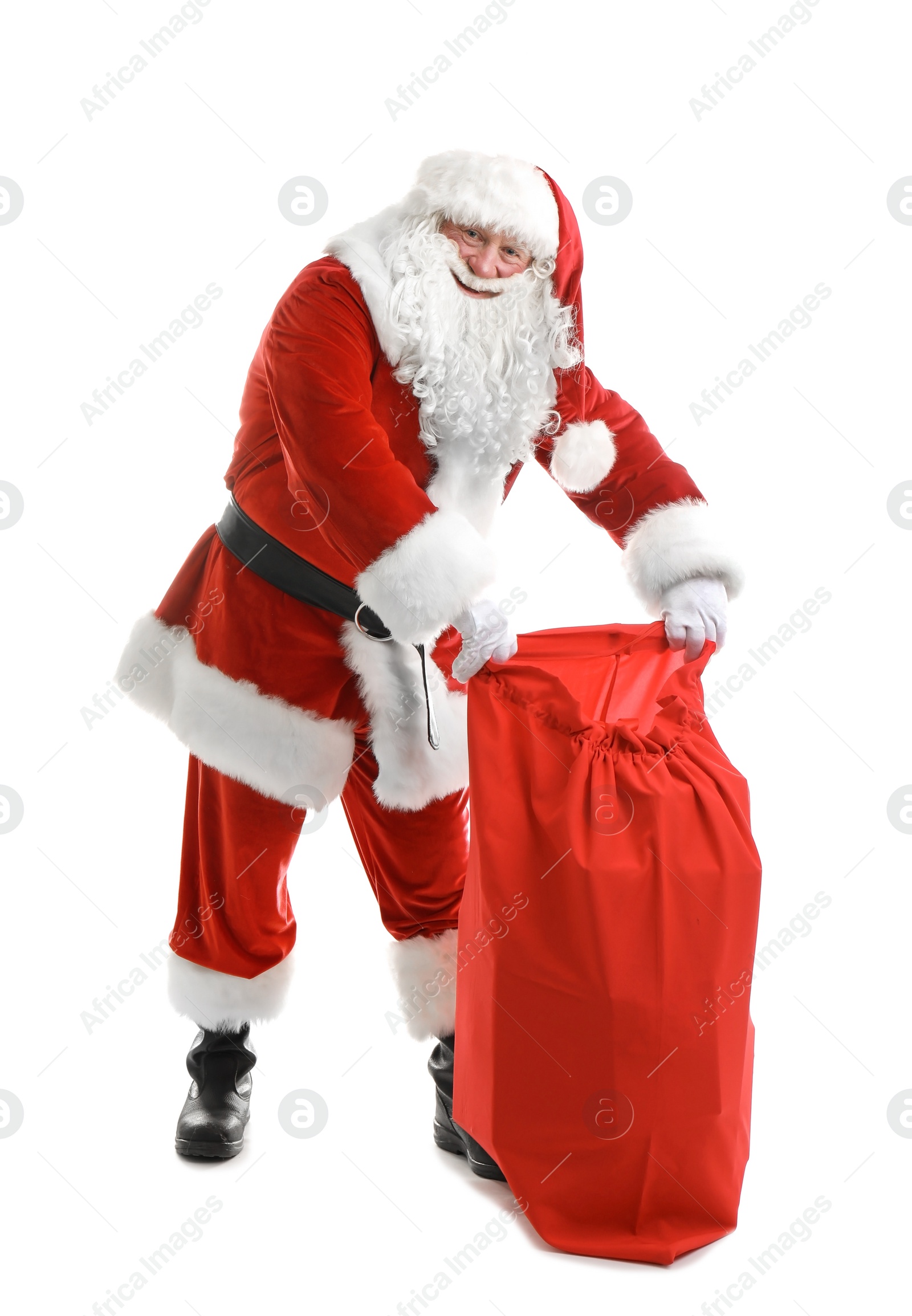 Photo of Authentic Santa Claus with red bag full of gifts on white background