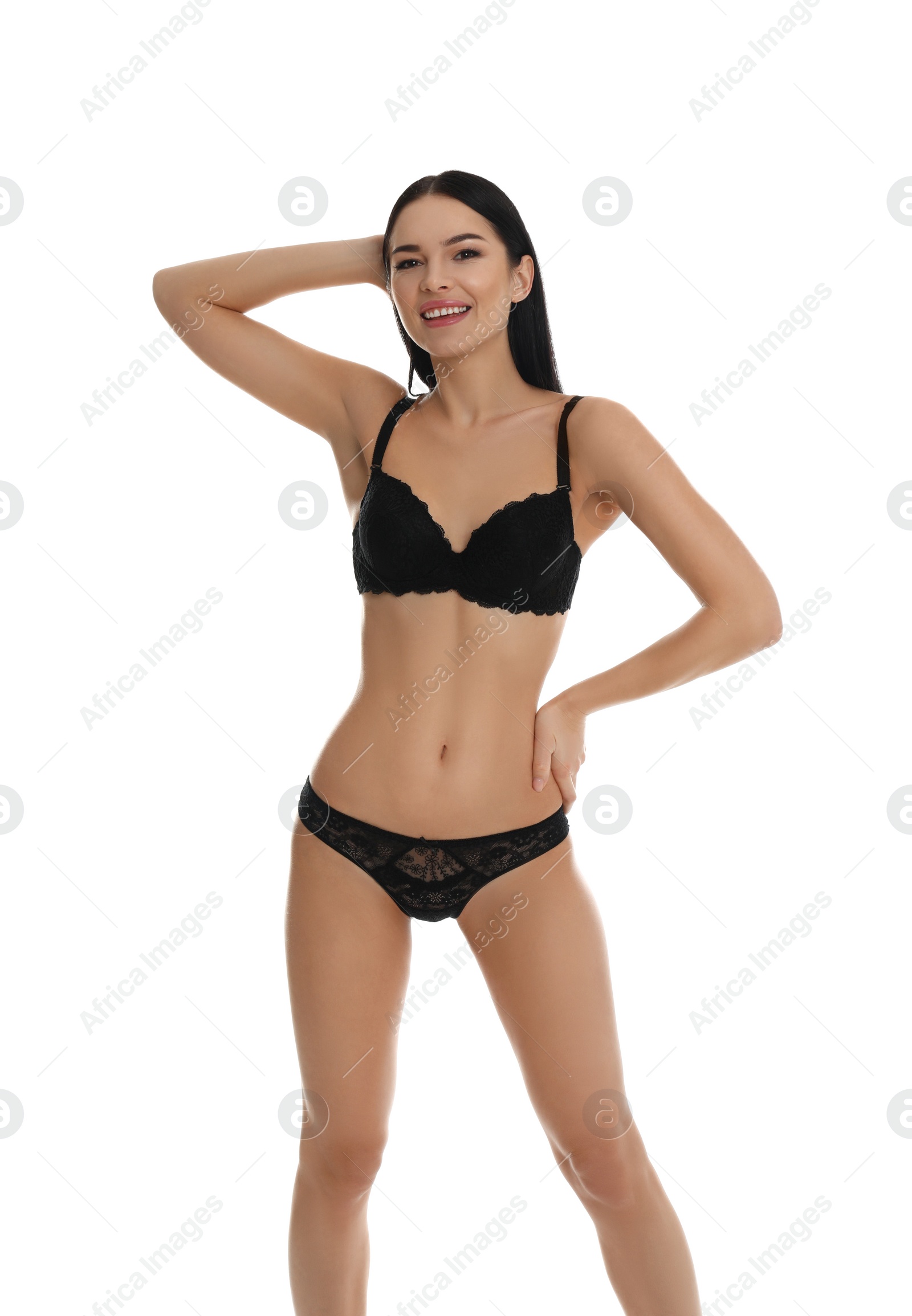 Photo of Beautiful young woman in black underwear isolated on white