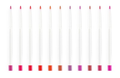 Set with lip pencils of different shades on white background. Decorative cosmetics