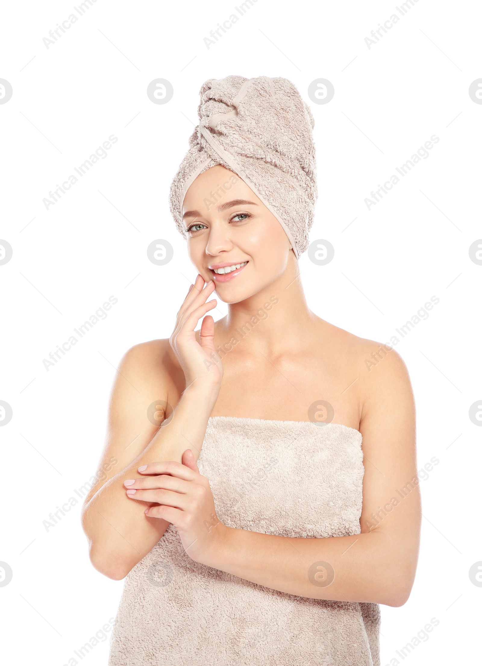 Photo of Portrait of young pretty woman with towels on white background