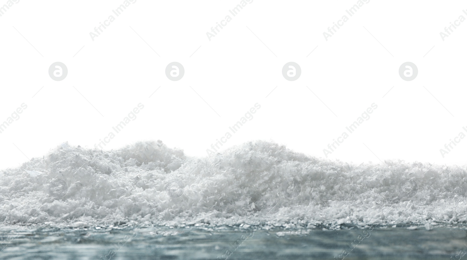 Photo of Wooden surface covered with snow against white background