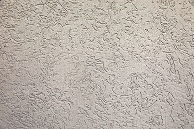 Photo of Texture of grey plaster wall as background