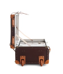 Photo of Open suitcase for travelling on white background