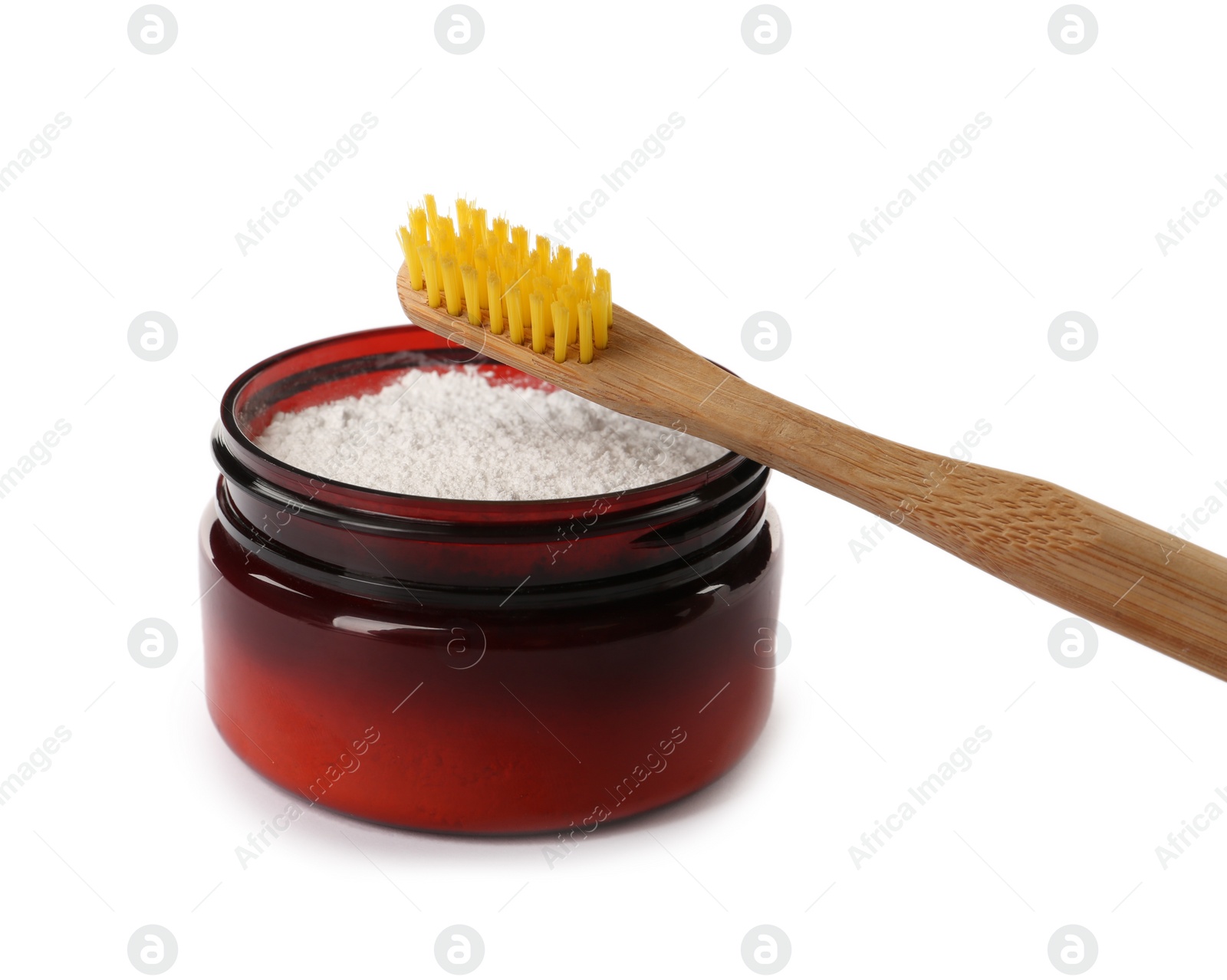 Photo of Jar of tooth powder and brush on white background