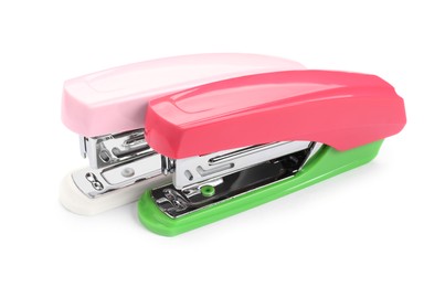 Photo of Two new bright staplers isolated on white