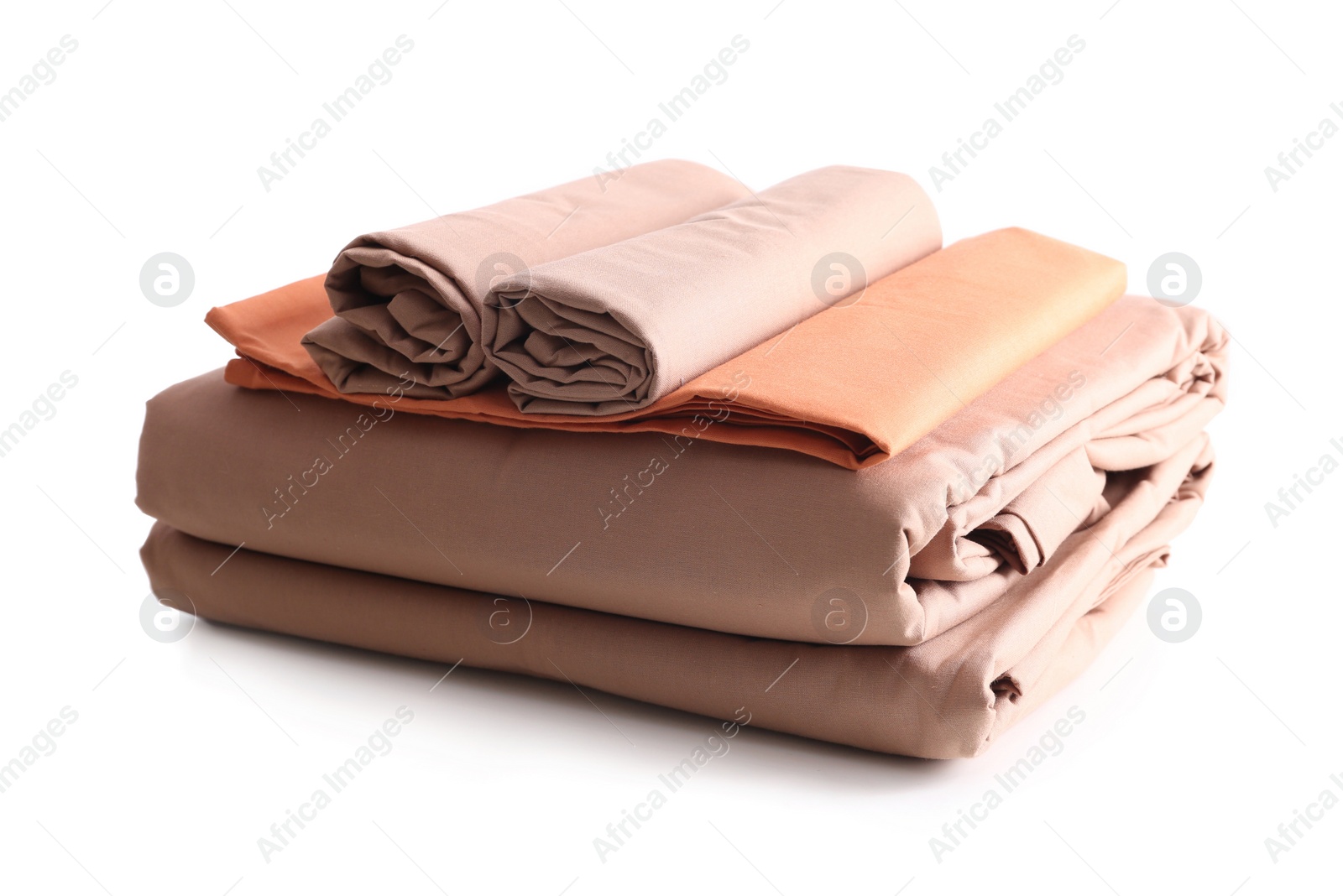 Photo of Stack of clean bed sheets isolated on white