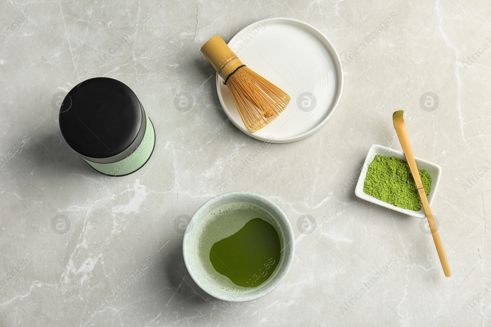 Photo of Flat lay composition with matcha tea on table