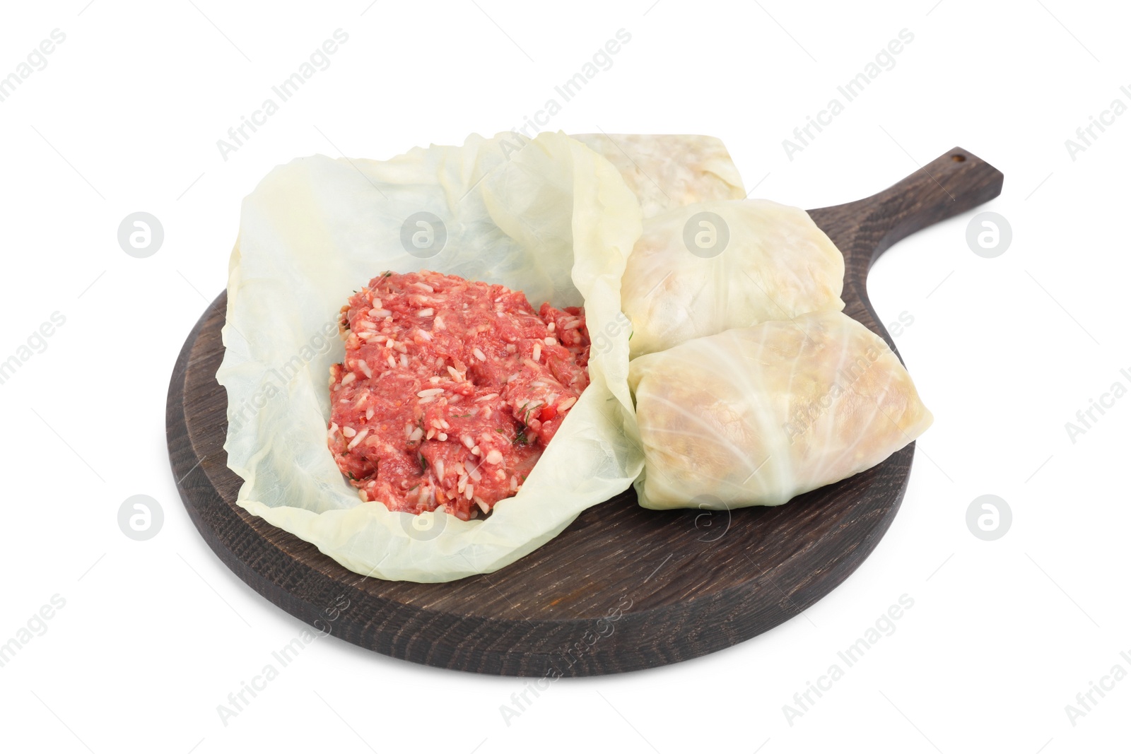 Photo of Board with stuffed cabbage rolls isolated on white