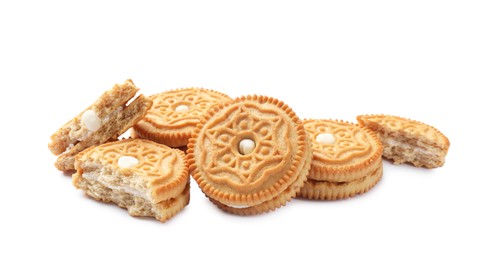 Photo of Many tasty sandwich cookies isolated on white