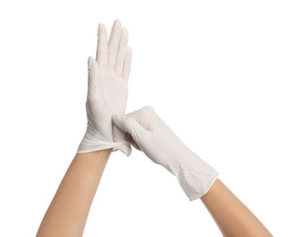 Photo of Doctor wearing medical gloves on white background, closeup