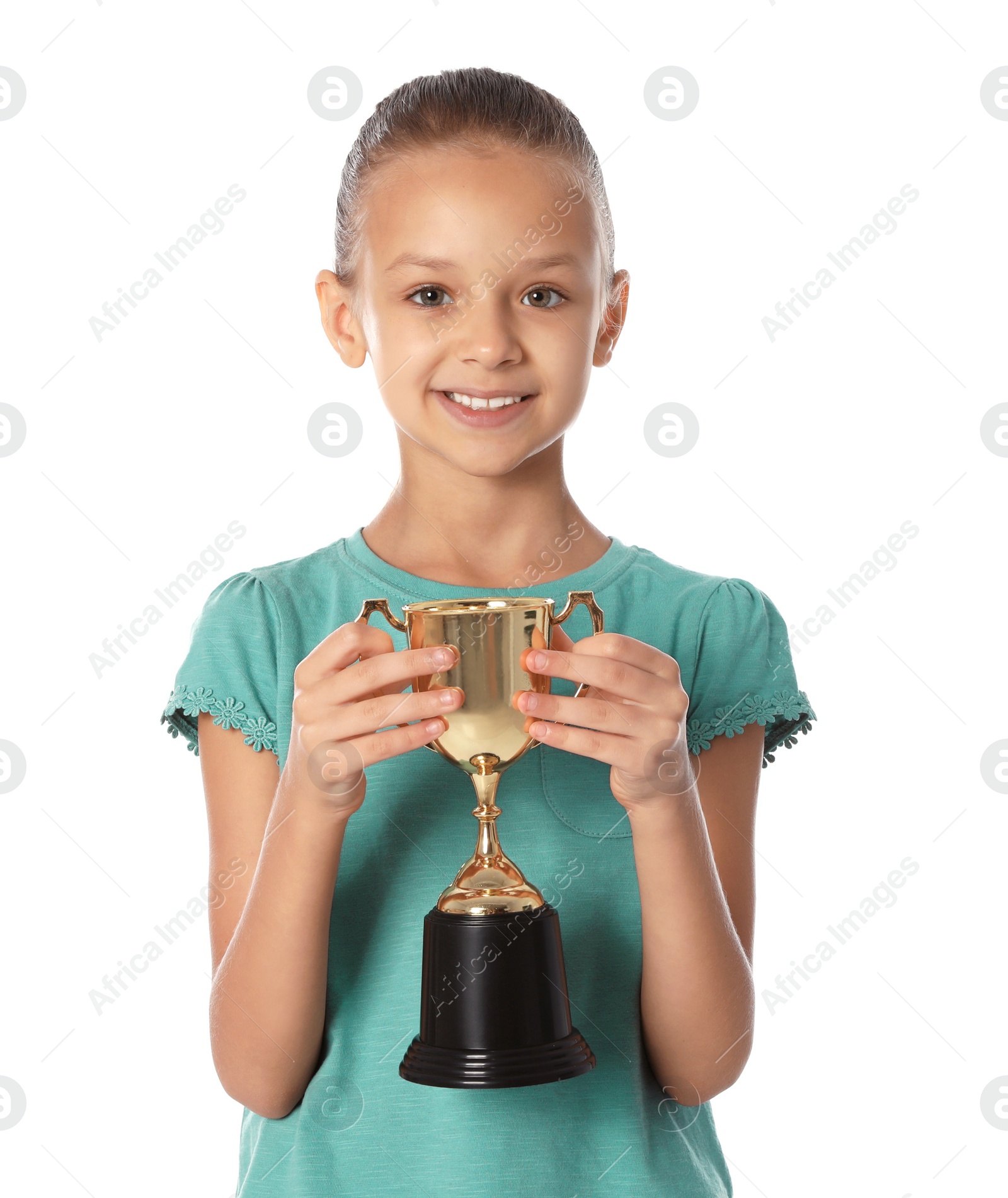 Photo of Happy girl with golden winning cup on white background