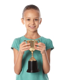 Happy girl with golden winning cup on white background