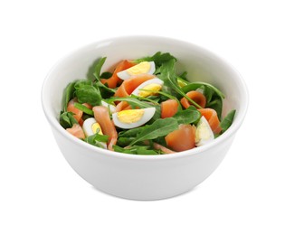 Photo of Delicious salad with boiled eggs, salmon and arugula in bowl isolated on white