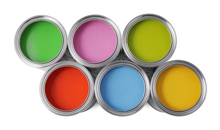 Photo of Cans of different paints on white background, top view